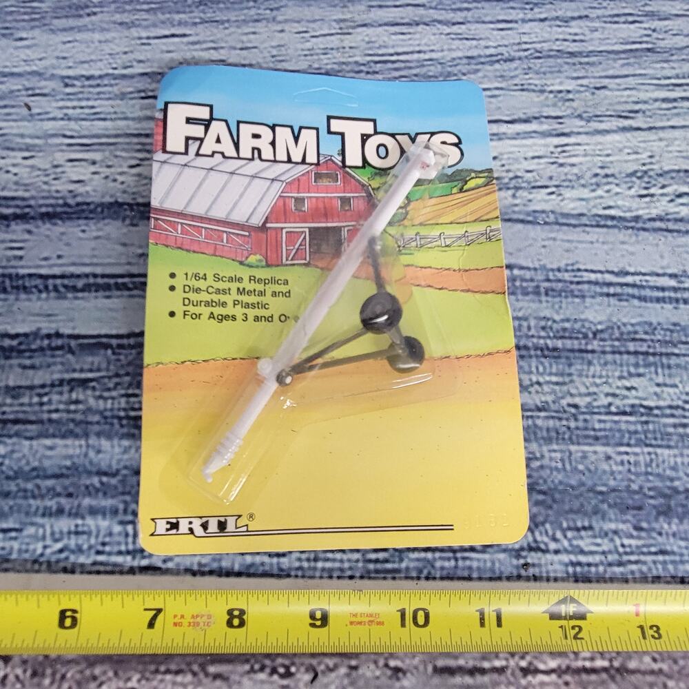 Vintage 1986 Ertl 1/64 scale FS grain auger white and black sealed